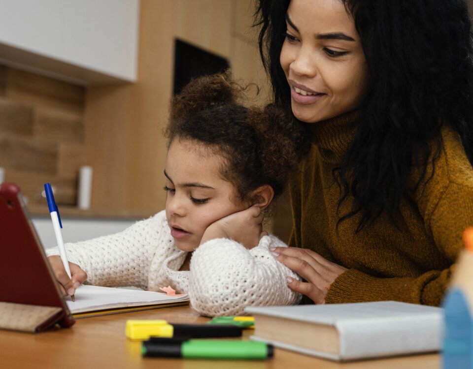 Homeschooling mom and daughter.