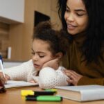 Homeschooling mom and daughter.